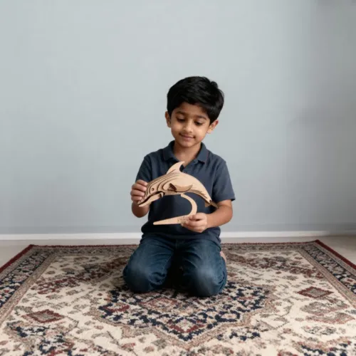 kid playing with dolphin puzzle